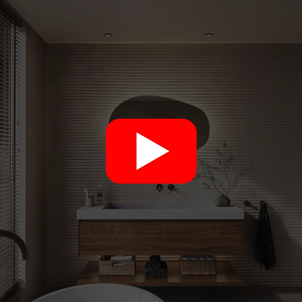 Produktvideo: Natura organisk spejl med baglys 100x65 cm Video af spejl i organisk form i 100×65 cm med baggrundsbelysning